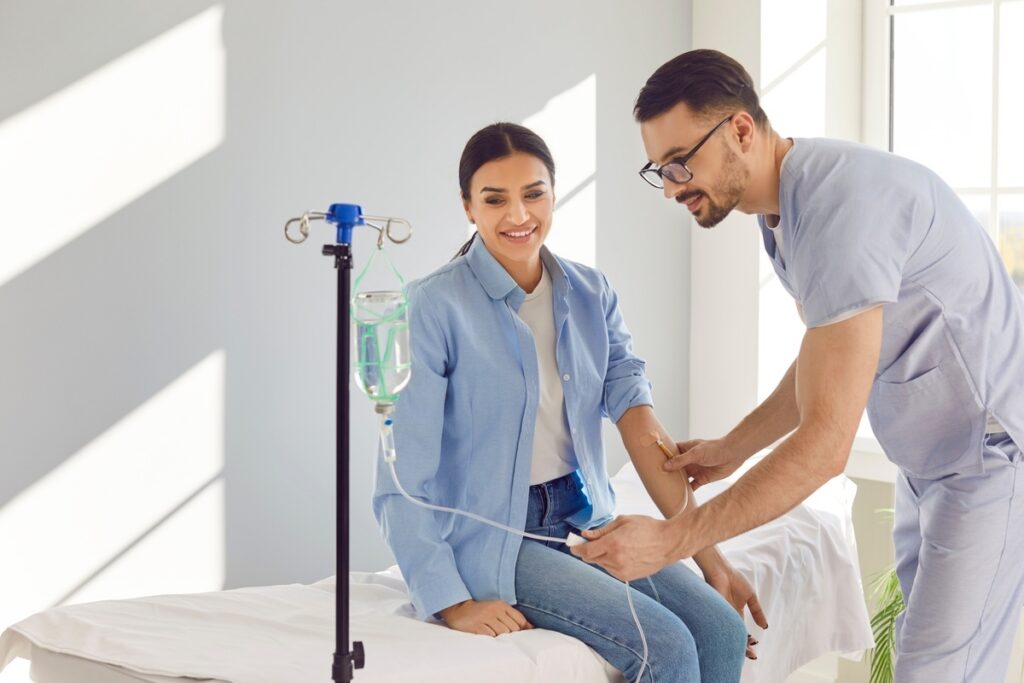 Patient receiving an IV drip, showing the IV hydration benefits of fast fluid and electrolyte delivery